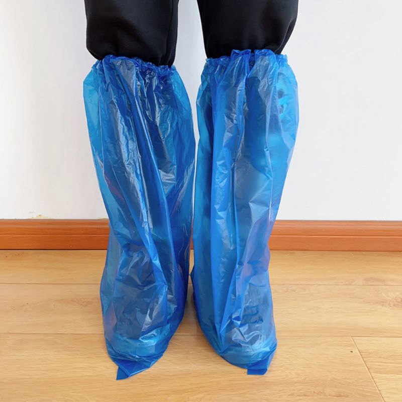 clear plastic rain boots over shoes