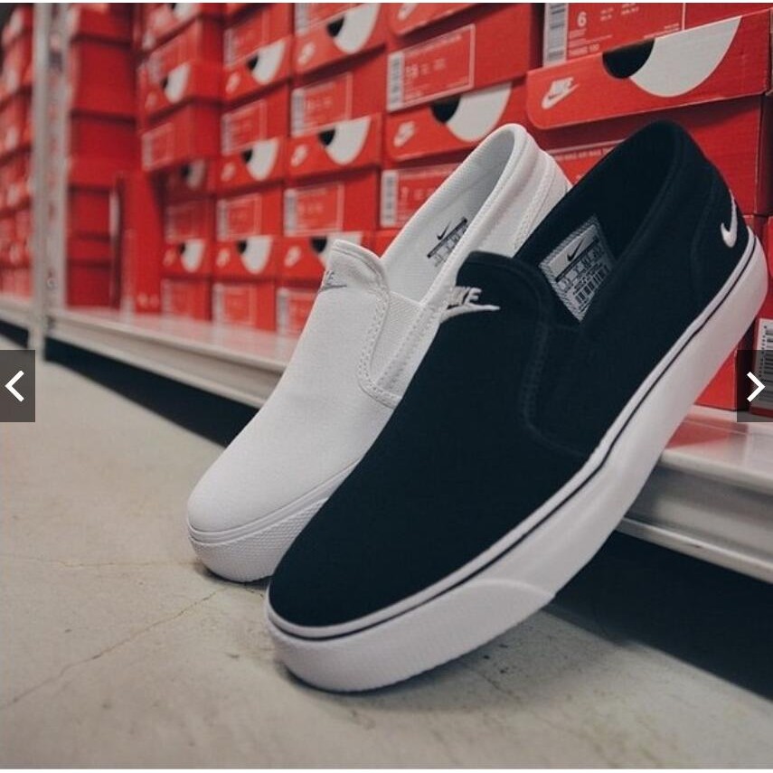 nike toki slip on price