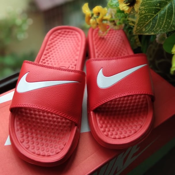 red nike slippers