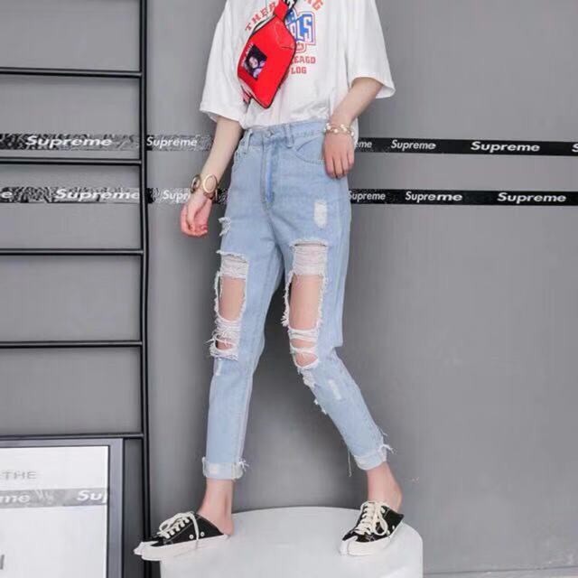 supreme ripped jeans