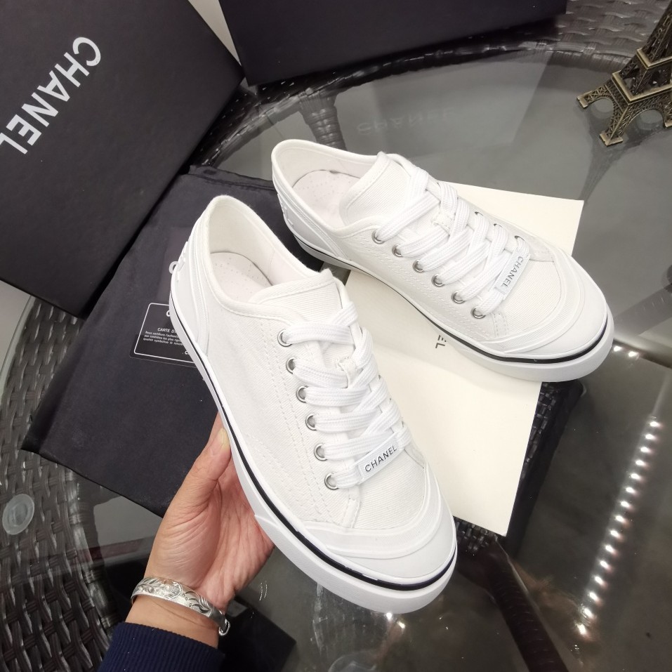 black and white chanel sneakers