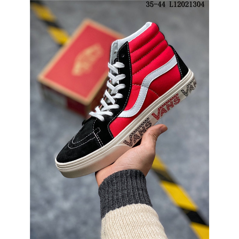 black and red low top vans
