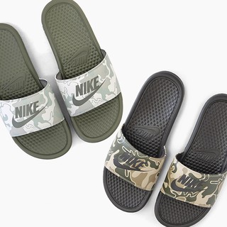 nike slides with smiley face