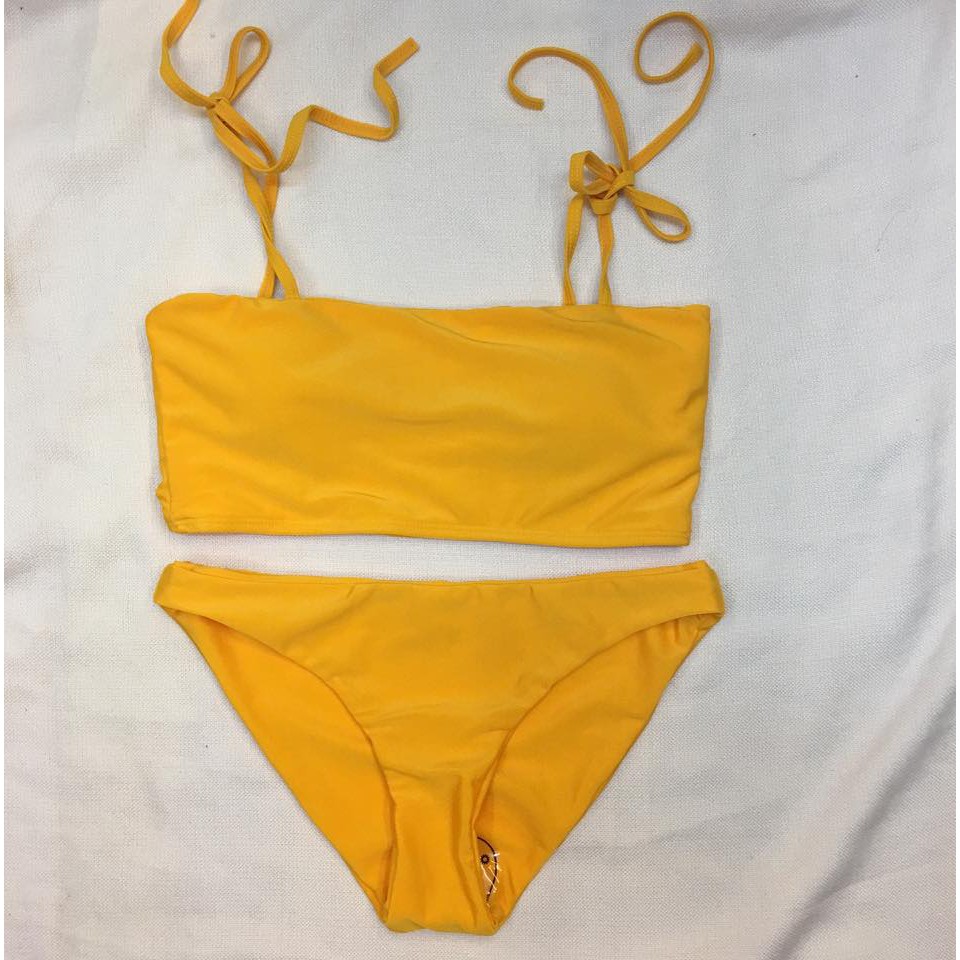 mustard colored swimsuit