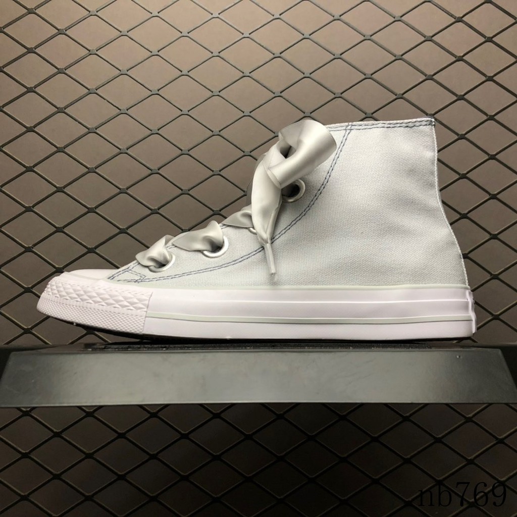 silver high top shoes