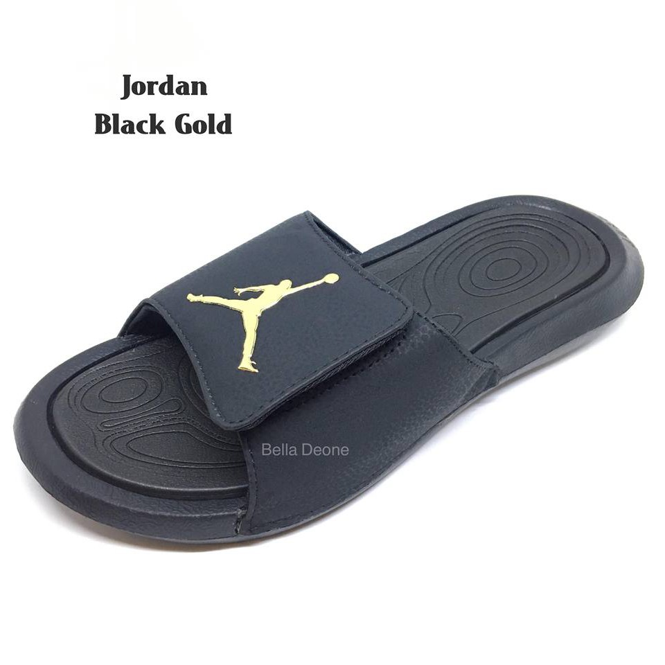 black and gold jordan slides