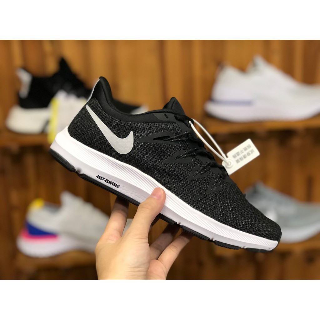 nike quest on feet