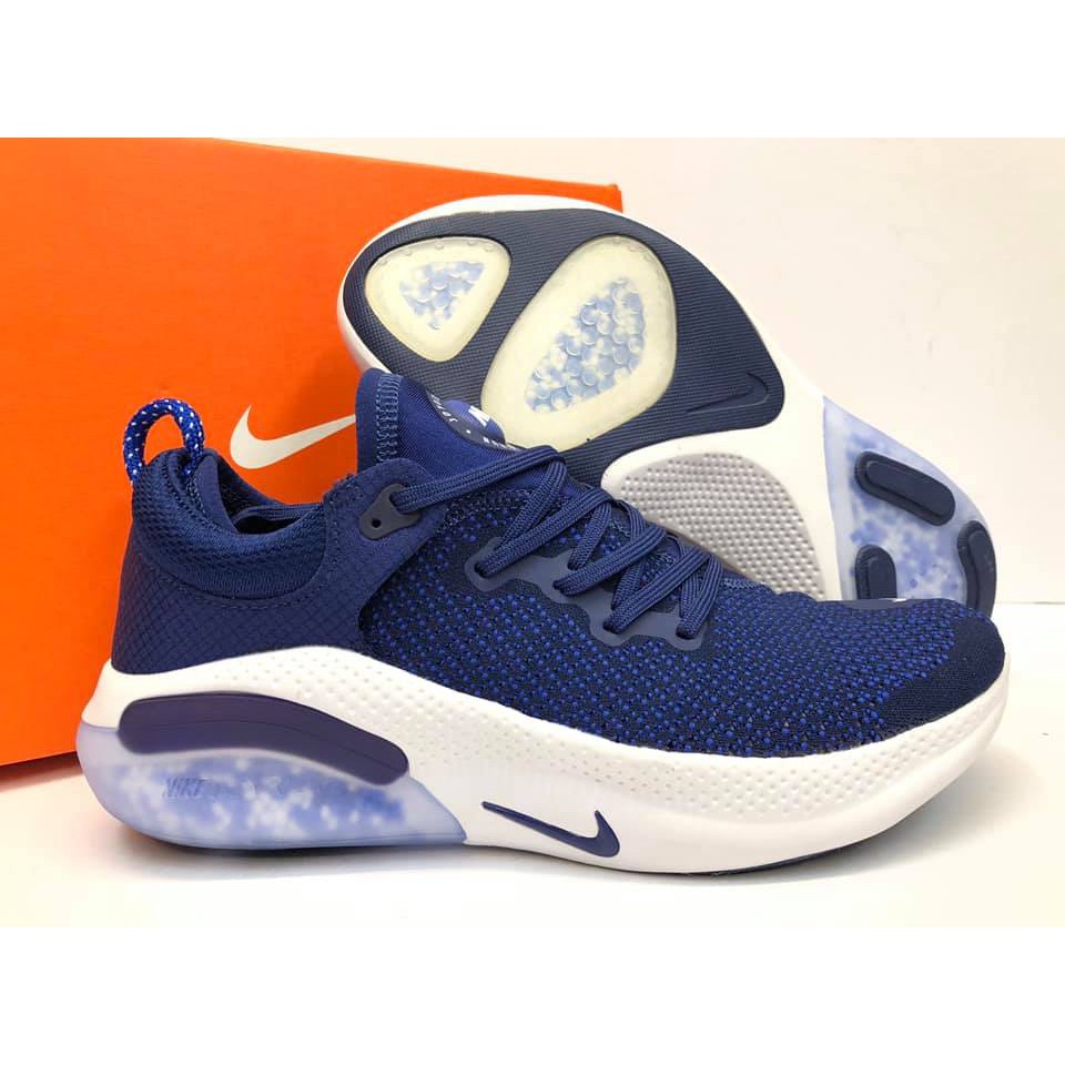 navy blue and white sneakers