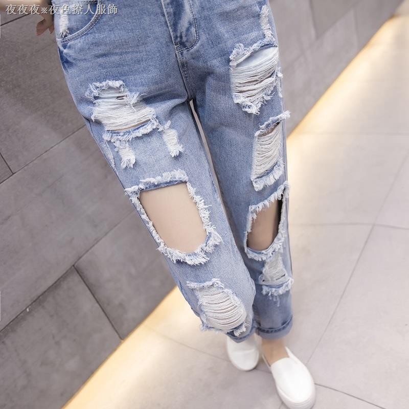 light colored distressed jeans