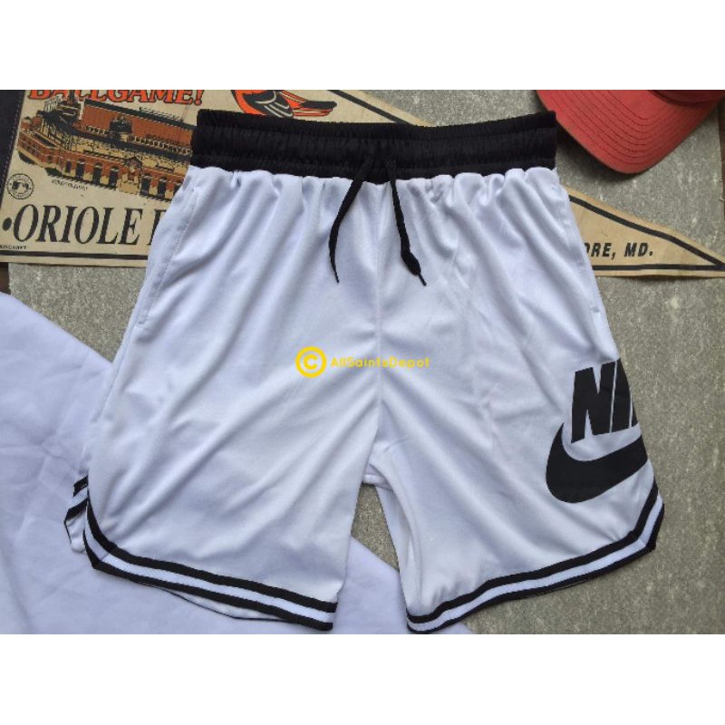 white nike shorts with pockets