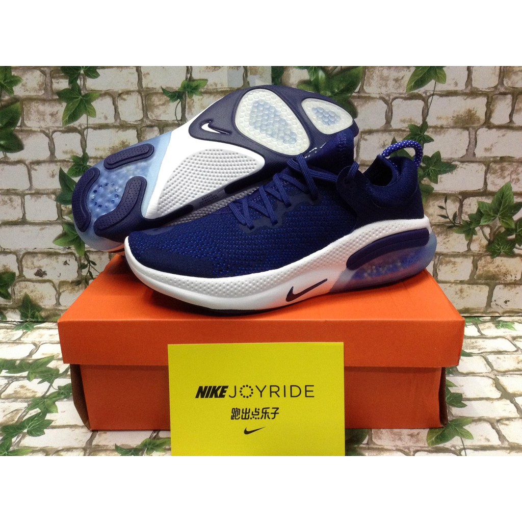 navy blue and white sneakers