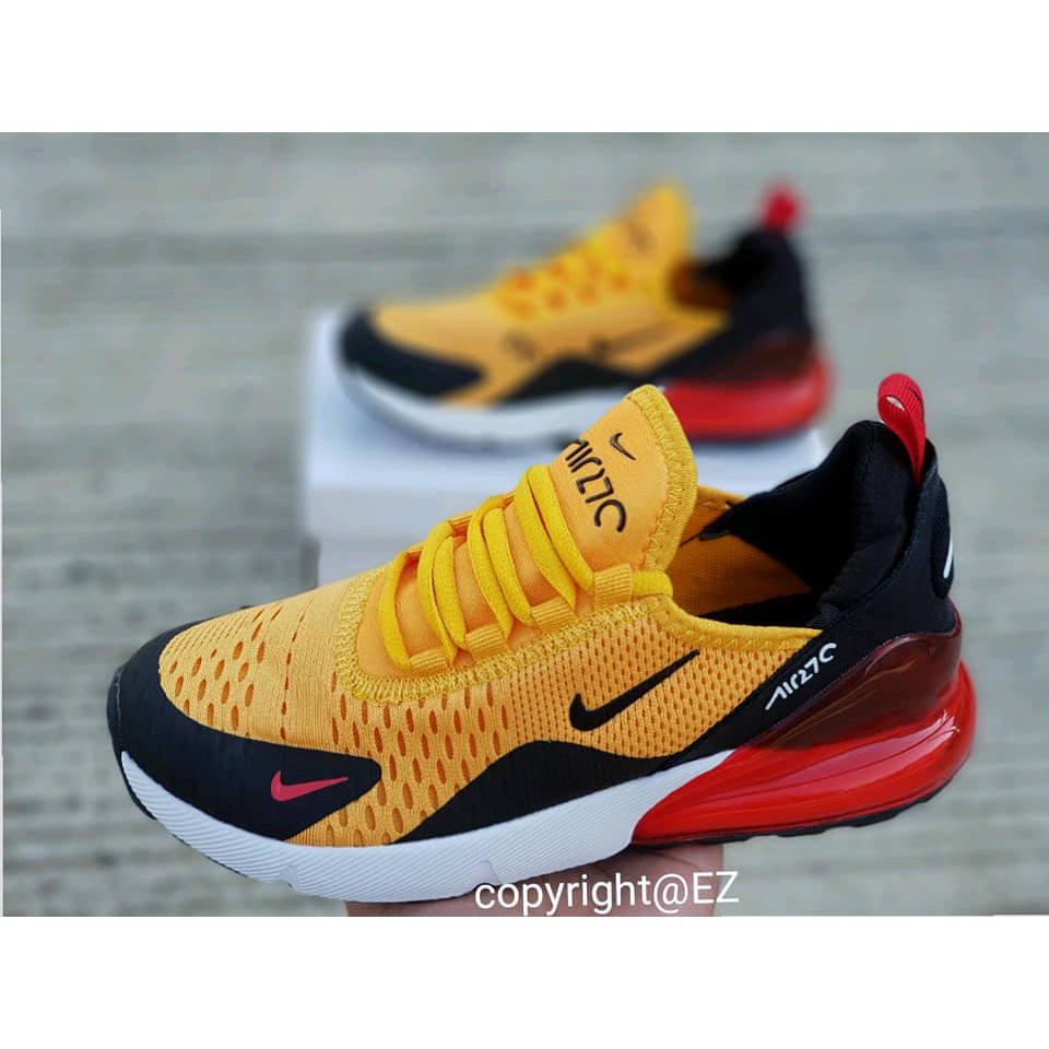 yellow and black nike 270