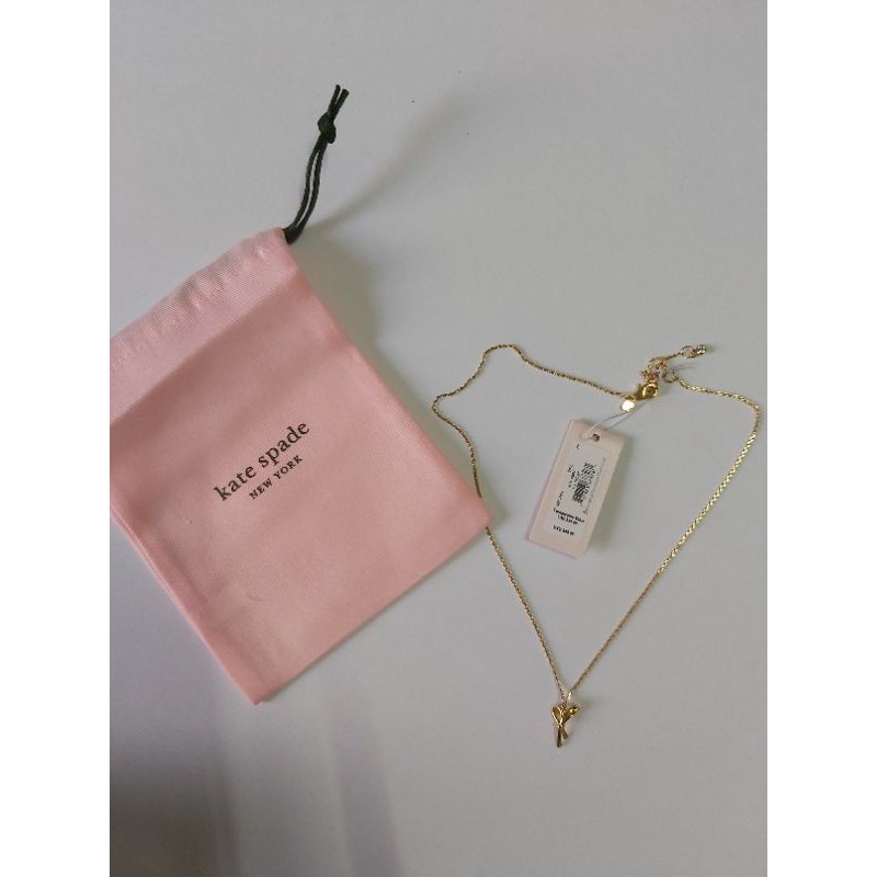 Authentic Kate Spade ALL TIED UP mini pendant gold | Shopee Philippines