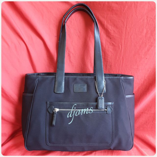 coach black tote with red lining
