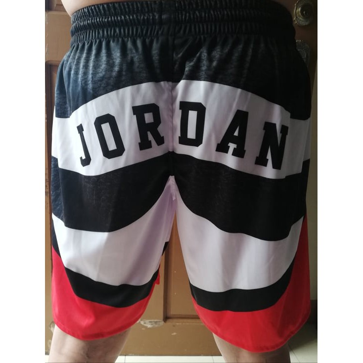 red black and white jordan shorts