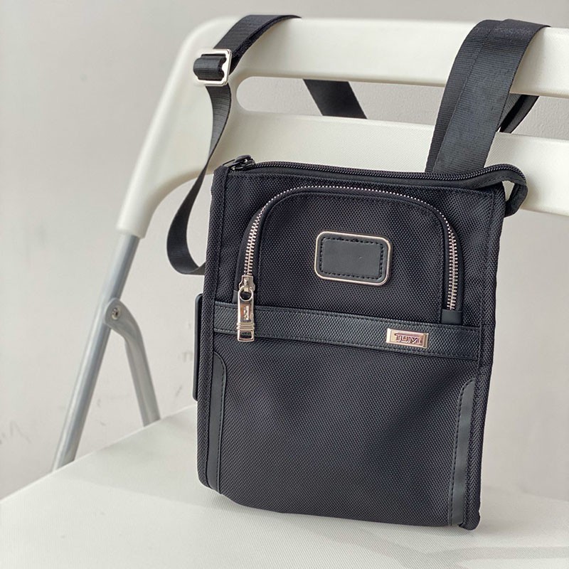 tumi over the shoulder bag