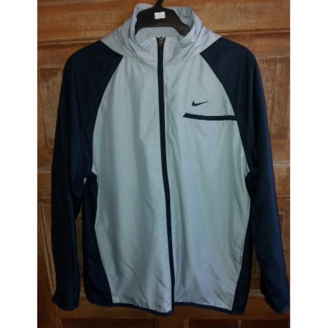 teal windbreaker nike