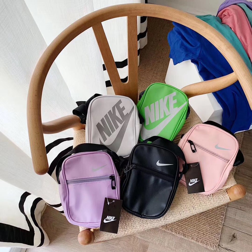 nike backpack purple and green