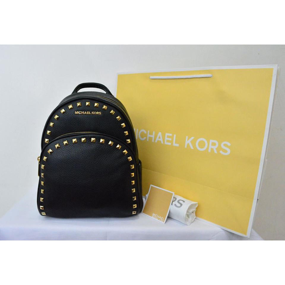 michael kors black backpack with gold studs