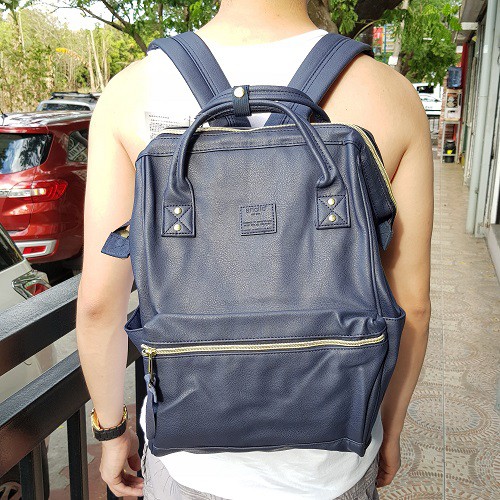 navy blue leather backpack