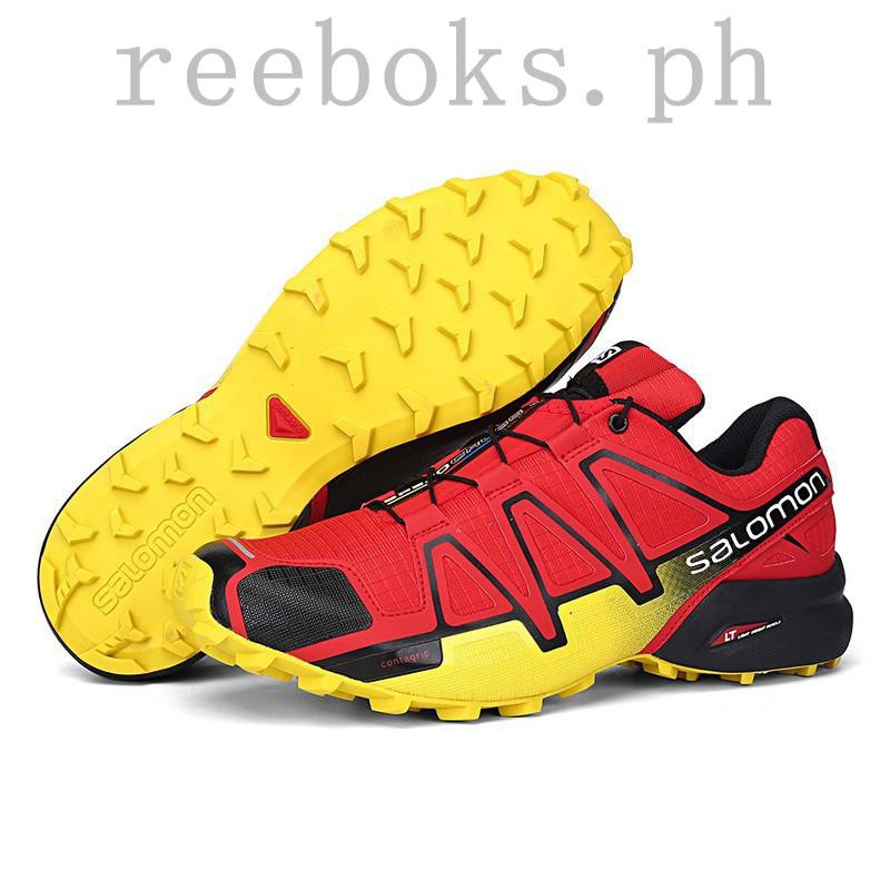 yellow salomon shoes