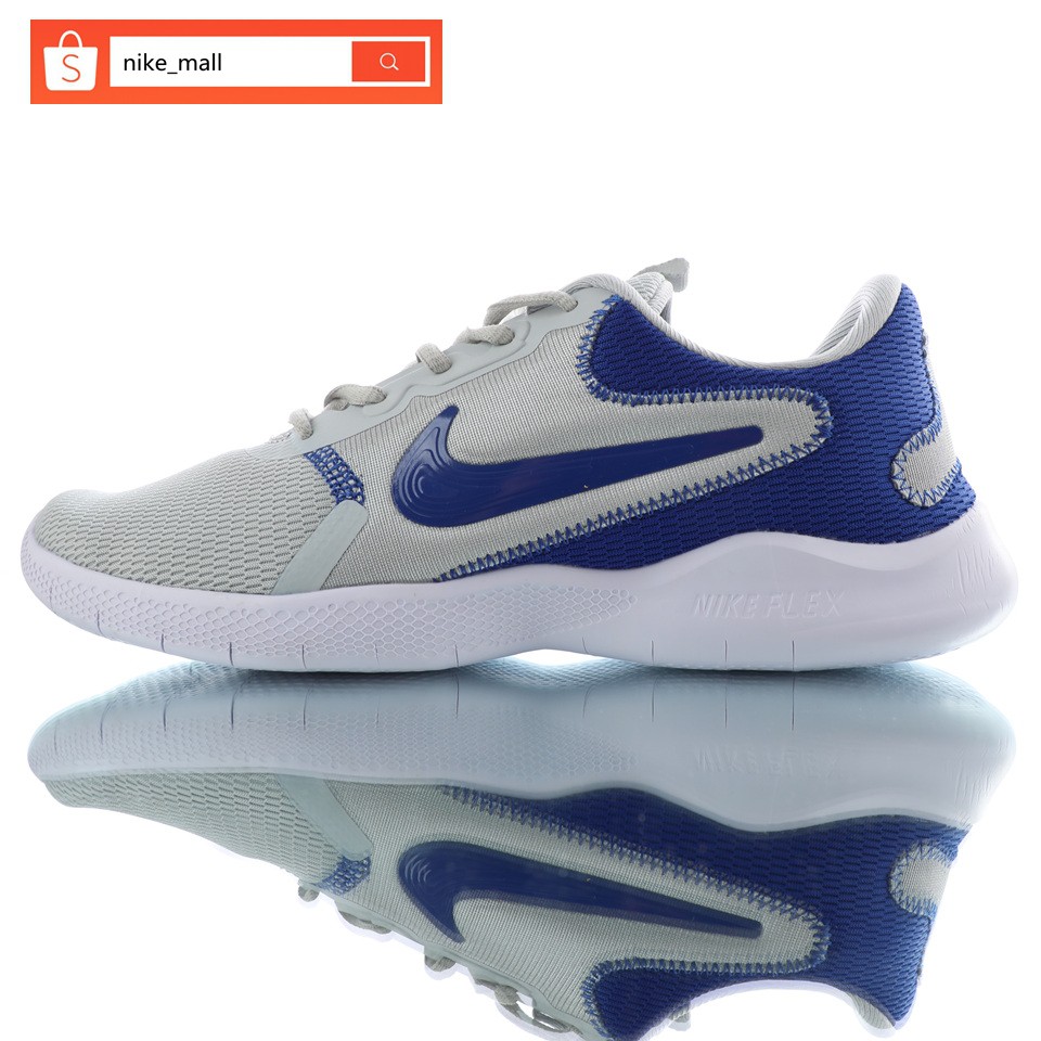 white and blue nike running shoes
