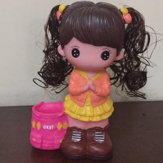 doll coin bank