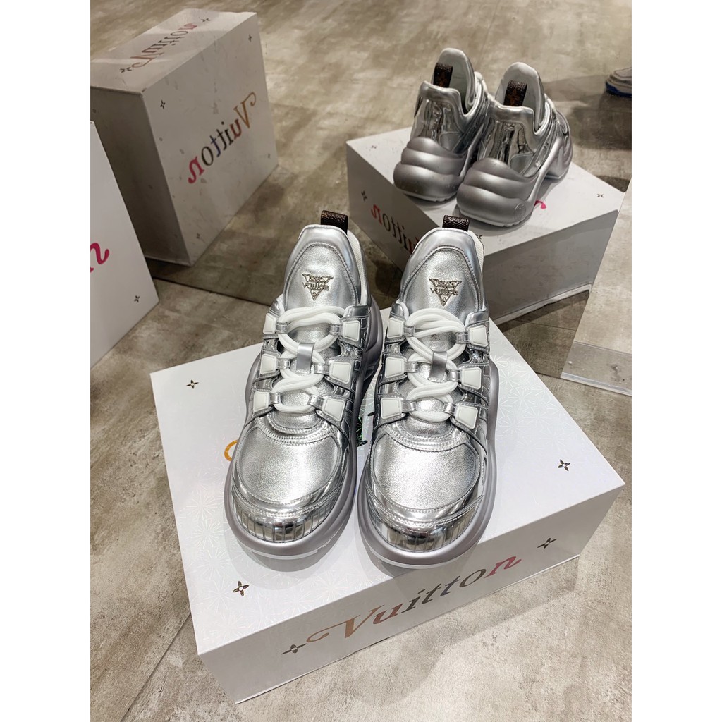 silver high top shoes