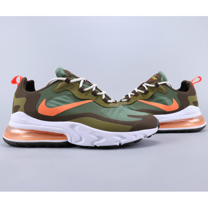 green and orange nike shoes