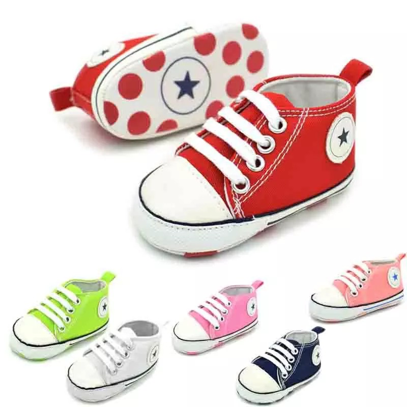 infant white canvas shoes