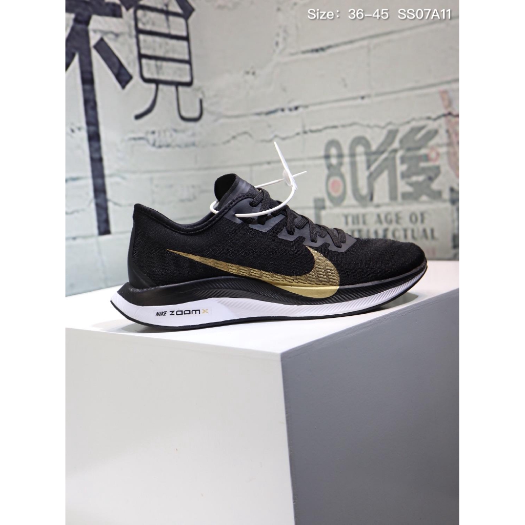 gold nike running shoes