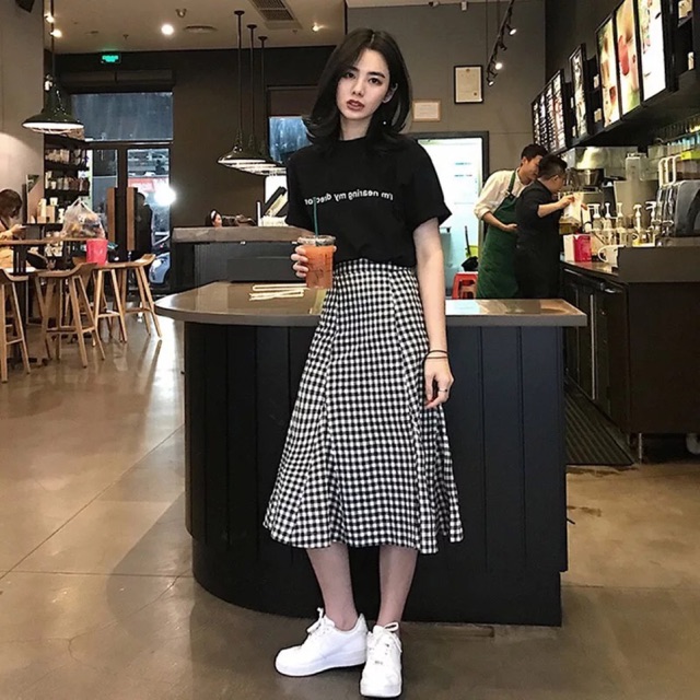 black t shirt and skirt