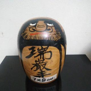 wooden daruma doll