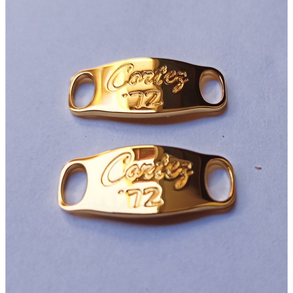 nike cortez metal piece