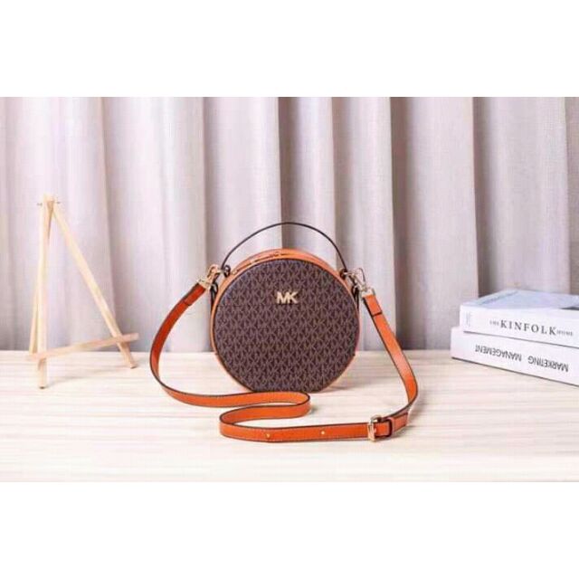 mk round sling bag