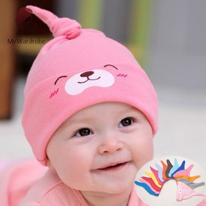 baby with cap