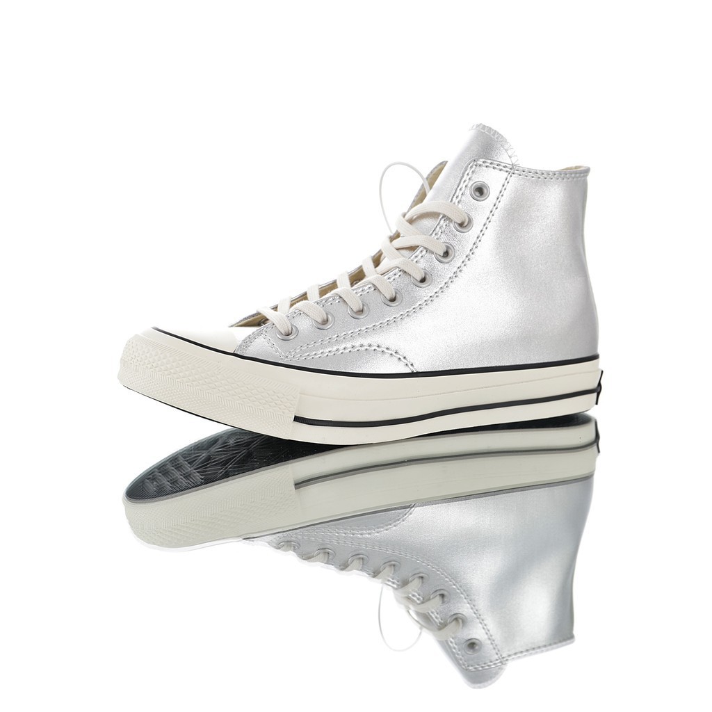 silver high top shoes