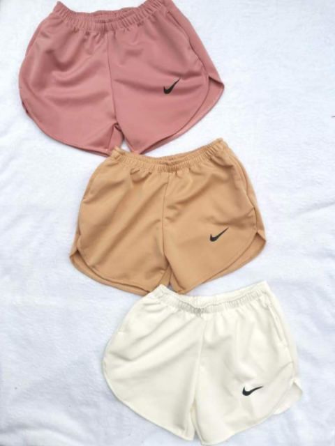 nude nike shorts