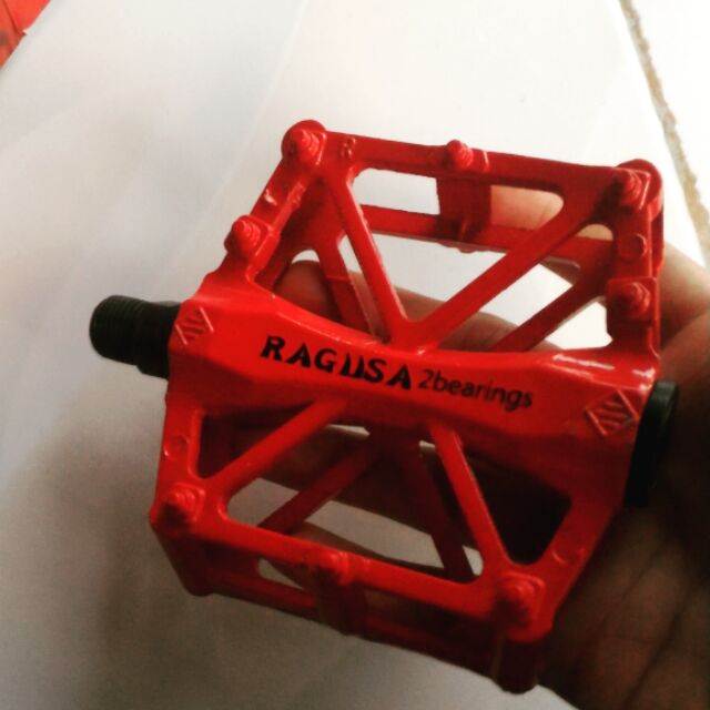 red bicycle pedals