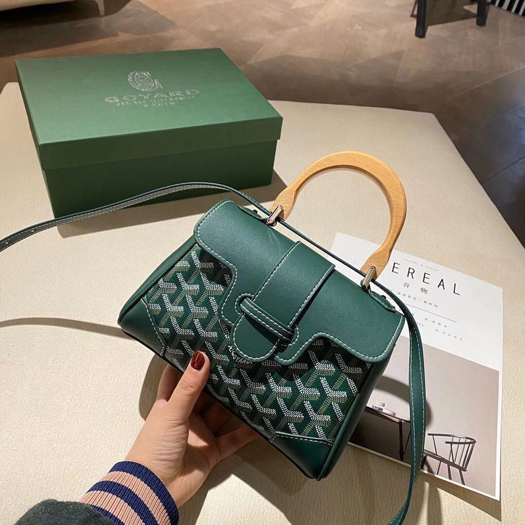 GOYARD, GREEN MINI SAIGON IN GOYARDINE CANVAS AND CALFSKIN WITH A WOODEN  TOP HANDLE, 2018, Handbags and Accessories, 2020