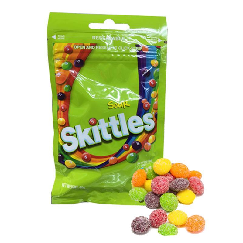 Skittles с кислой присыпкой. кислый скитлс. кислый скитлс. скитлс конфеты кислые. кислый скитлс с присыпкой.