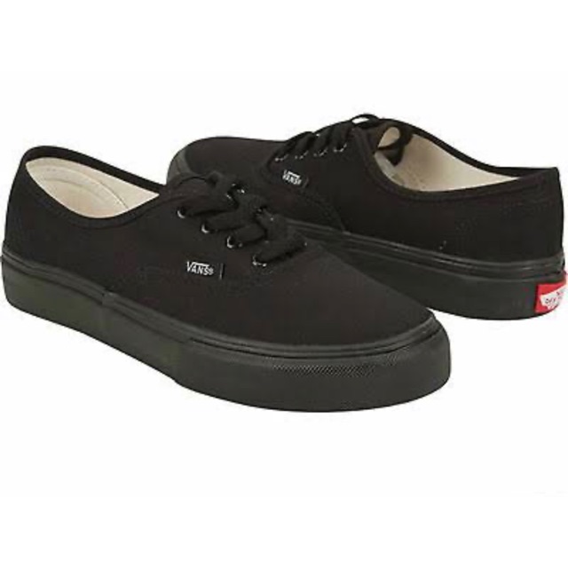 all black low top vans