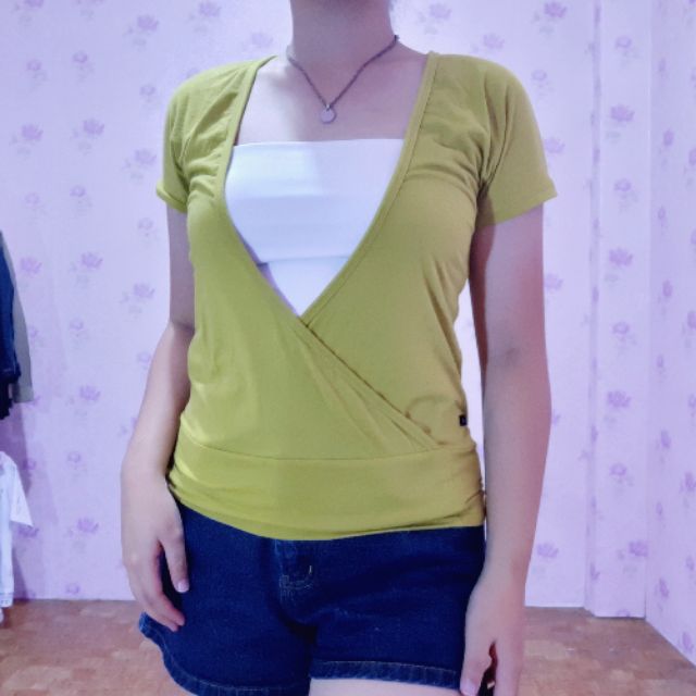 green shirt and jeans