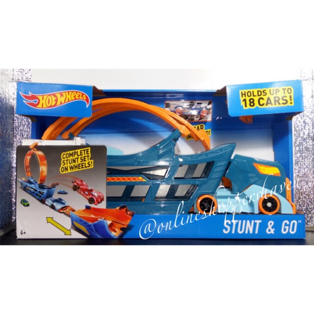 hot wheels stunt & go hauler with 10 vehicles