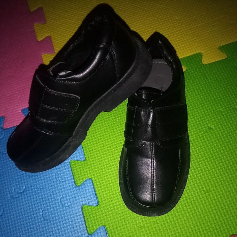 branded black shoes