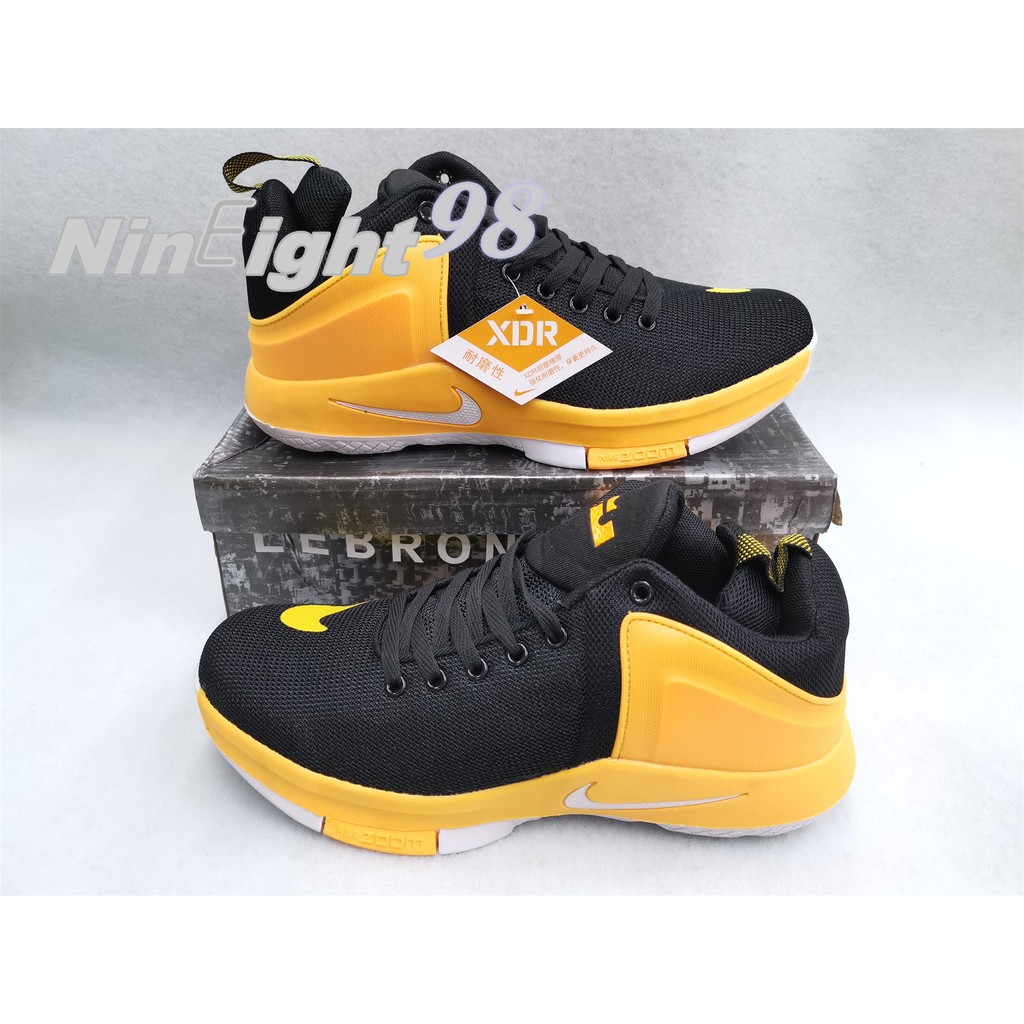 lebron james black and yellow shoes