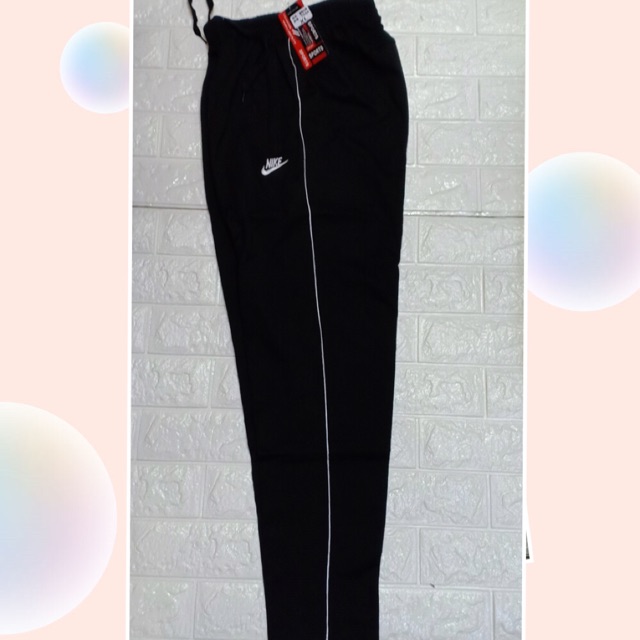 nike track pants with zipper