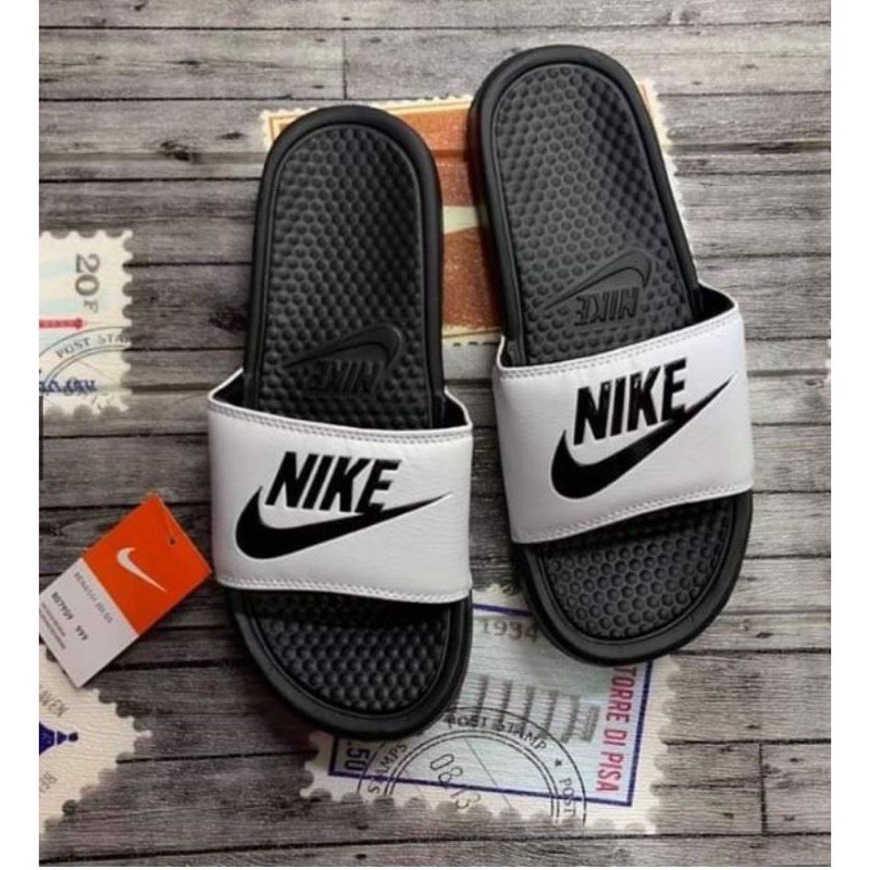 nike slippers price