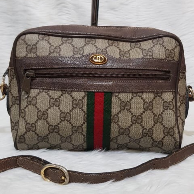 authentic gucci sling bag