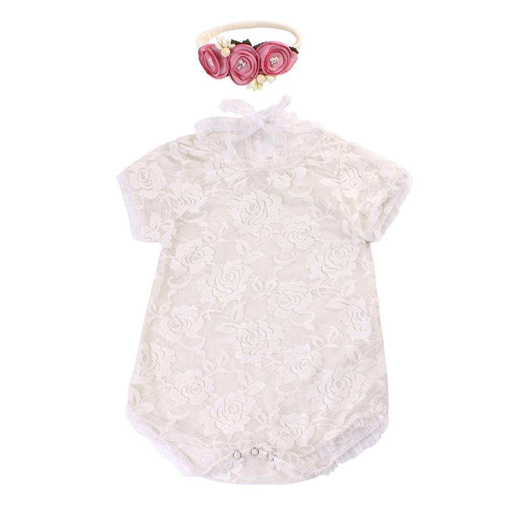 white newborn romper